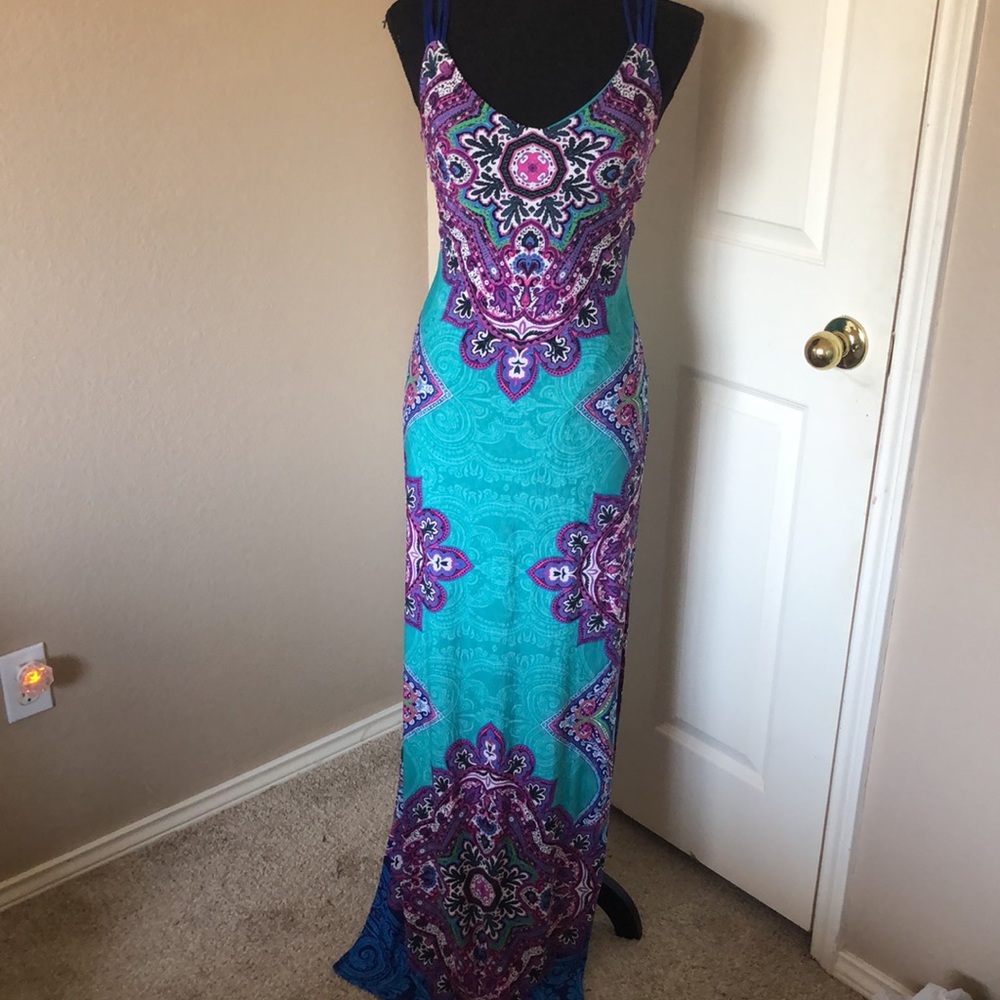 Beautiful Maxi Dress with Double Slits and partially lined.